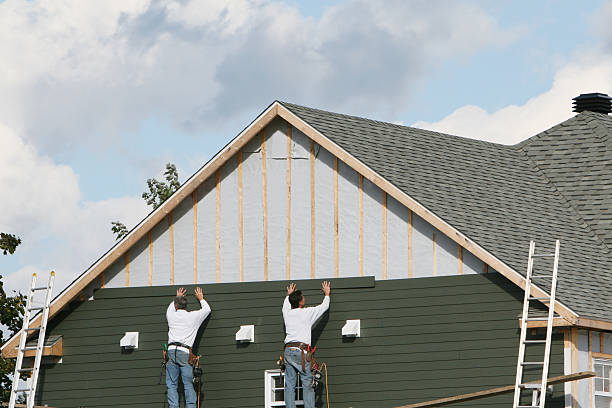 Professional Storm Damage Siding Repair technician working in Drewryville, VA